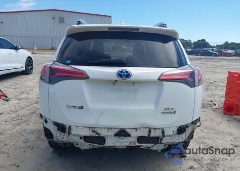 2016 Toyota Rav4 Hybrid Xle z USA, uszkodzony, nr VIN JTMRJREV7GD030659